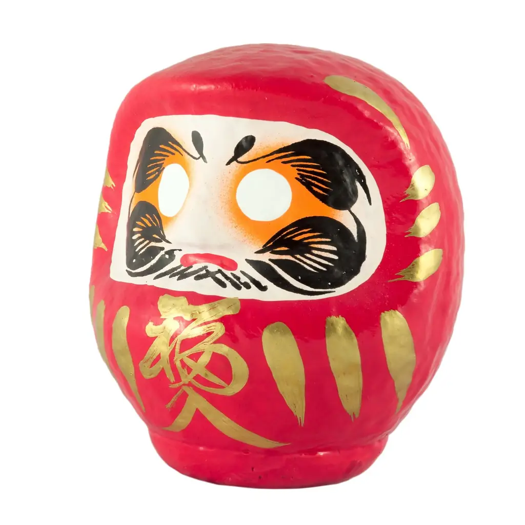 The red wishing doll among the keepsakes