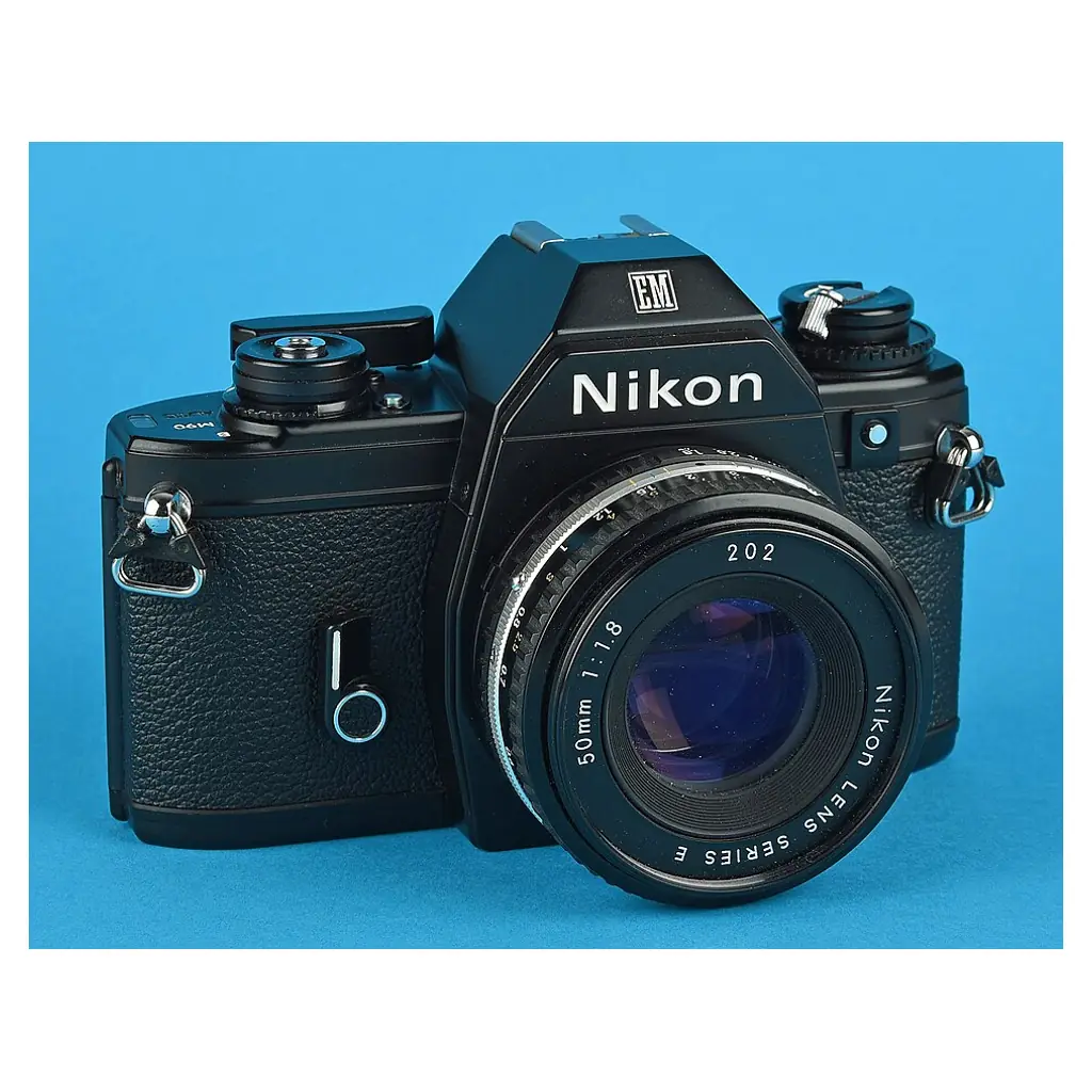 Nikon EM camera with 50mm lens.
