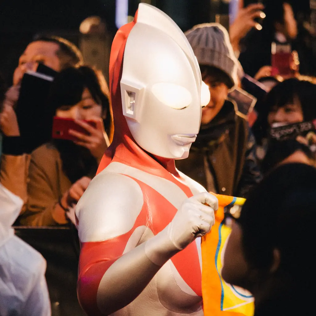 An Ultraman figure in a crowd at the Tokyo International Film Festival.