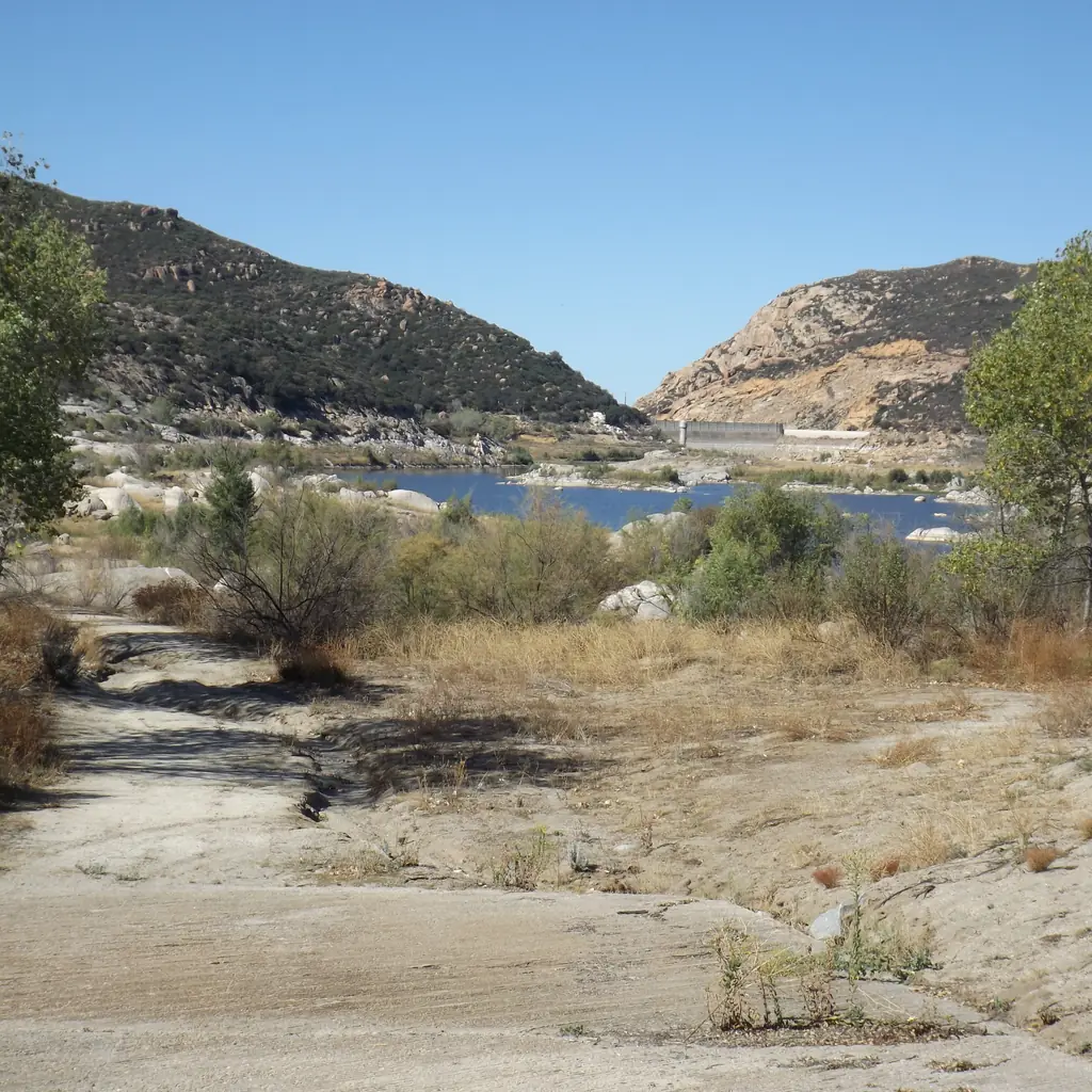 A dry reservoir bed during a drought.